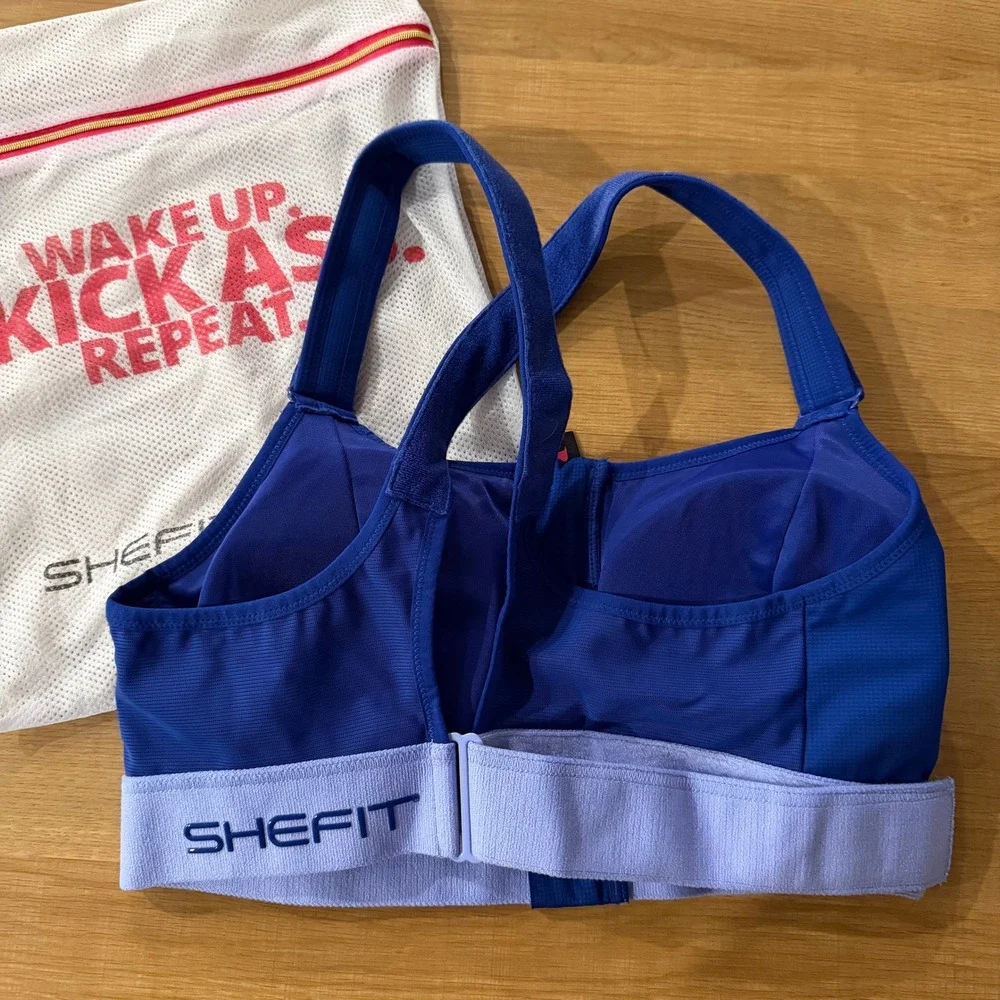 SHEFIT NWOT Ultimate Sports Bra Blue Size 2 Luxe High Impact Front Zip Wash Bag - Picture 3 of 6